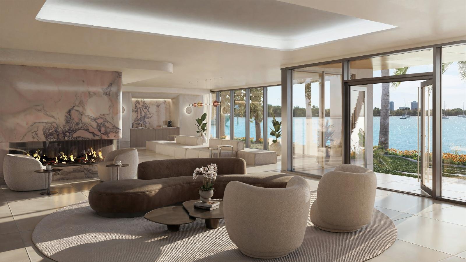 Tula Residences, sala de estar com lareira em mármore e vista para a baía
